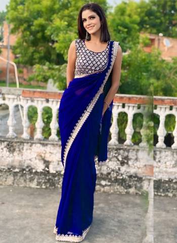 Attrective These Party Wear Saree in Fine Colored.These Saree Are Georgette And Blouse is Art Silk Fabricated.Its Beautified With Designer Sequance Embroidery Work Lace Border And Blouse.