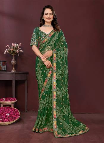 Garb These Party Wear Saree in Fine Colored.These Saree Are Georgette Are Georgette And Blouse is Art Silk Fabricated.Its Beautified With Designer Bandhani Printed With Embroidery Work Lace Border And Blouse.