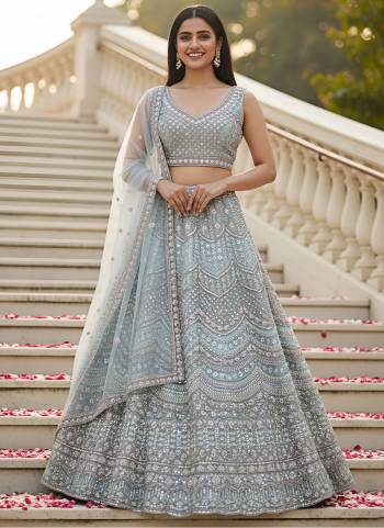 For A Fancy Designer Look,Grab These Lehenga Choli With Dupatta in Fine Colored.These Lehenga And Choli Are Net And Dupatta Are Fabricated On Soft Net Pair.Its Beautified With Heavy Designer Sequance,Dori Embroidery,Modif Crystal Pipe,Beads Hand Work. 