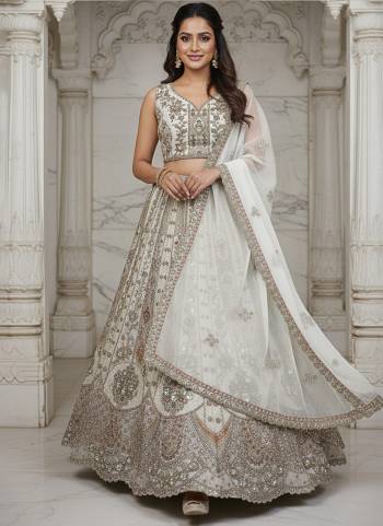 For A Fancy Designer Look,Grab These Lehenga Choli With Dupatta in Fine Colored.These Lehenga And Choli Are Organza And Dupatta Are Fabricated On Organza Pair.Its Beautified With Heavy Designer Sequance,Jari,Dori,Multy Thread Embroidery,Diamond Work. 