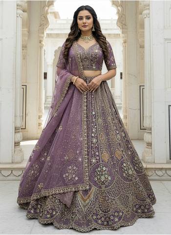 For A Fancy Designer Look,Grab These Lehenga Choli With Dupatta in Fine Colored.These Lehenga And Choli Are Organza And Dupatta Are Fabricated On Organza Pair.Its Beautified With Heavy Designer Sequance,Jari,Dori,Multy Thread Embroidery,Diamond Work. 