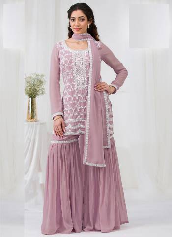 Garb These Designer Plazzo Suit in Fine Colored Pair With Bottom And Dupatta.These Top Are Georgette And Dupatta Are Fabricated On Georgette Pair With Georgette Bottom.Its Beautified With Santoon Inner.Its Beautified With Heavy Designer Embroidery Work.