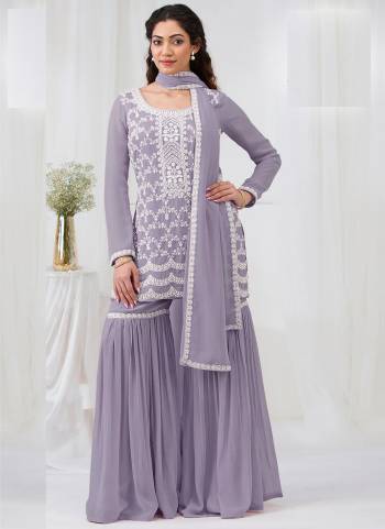 Garb These Designer Plazzo Suit in Fine Colored Pair With Bottom And Dupatta.These Top Are Georgette And Dupatta Are Fabricated On Georgette Pair With Georgette Bottom.Its Beautified With Santoon Inner.Its Beautified With Heavy Designer Embroidery Work.
