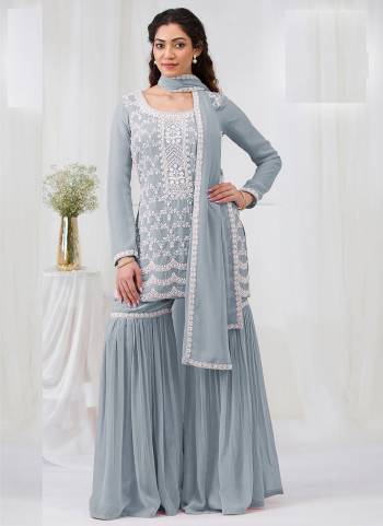Garb These Designer Plazzo Suit in Fine Colored Pair With Bottom And Dupatta.These Top Are Georgette And Dupatta Are Fabricated On Georgette Pair With Georgette Bottom.Its Beautified With Santoon Inner.Its Beautified With Heavy Designer Embroidery Work.