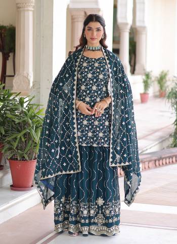 Attactive These Beautiful Looking Readymade Sharara Suit With Dupatta.These Top Bottom And Dupatta is Fabricated On Faux Georgette.Its Beautified With Designer Sequance Embroidery Work.