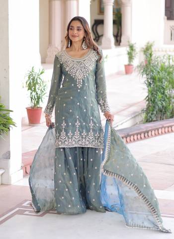 Attactive These Beautiful Looking Readymade Sharara Suit With Dupatta.These Top Bottom And Dupatta is Fabricated On Fendy Silk.Its Beautified With Designer Sequance Embroidery Work.