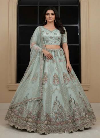 For A Fancy Designer Look,Grab These Lehenga Choli With Dupatta in Fine Colored.These Lehenga And Choli Are Net And Dupatta Are Fabricated On Soft Net Pair.Its Beautified With Heavy Designer Sequance,Chapat Jari,Dori,Multy Thread Embroidery,Diamond Work. 