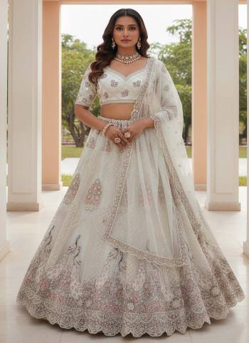 For A Fancy Designer Look,Grab These Lehenga Choli With Dupatta in Fine Colored.These Lehenga And Choli Are Net And Dupatta Are Fabricated On Soft Net Pair.Its Beautified With Heavy Designer Sequance,Chapat Jari,Dori,Multy Thread Embroidery,Diamond Work. 