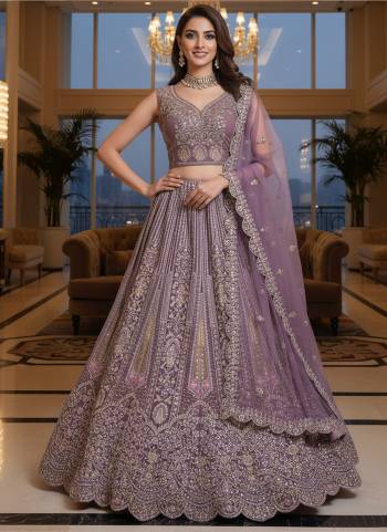For A Fancy Designer Look,Grab These Lehenga Choli With Dupatta in Fine Colored.These Lehenga And Choli Are Net And Dupatta Are Fabricated On Soft Net Pair.Its Beautified With Heavy Designer Sequance, Jari,Dori,Multy Thread Embroidery,Zarcon Diamond Work. 