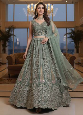 For A Fancy Designer Look,Grab These Lehenga Choli With Dupatta in Fine Colored.These Lehenga And Choli Are Net And Dupatta Are Fabricated On Soft Net Pair.Its Beautified With Heavy Designer Sequance, Jari,Dori,Multy Thread Embroidery,Zarcon Diamond Work. 