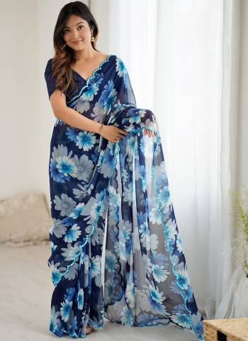 Garb These Party Wear Saree in Fine Colored.These Saree Are Georgette And Blouse is Georgette Fabricated.Its Beautified With Designer Printed With Mirror Cut Work Border.