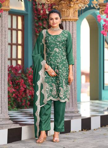 Attrective Looking These Party Wear Suit in Fine Colored Pair With Bottom And Dupatta.These Top Are Silk And Dupatta Are Fabricated On Silk Pair With Santoon Bottom.Its Beautified With Designer Heavy Embroidery Work.