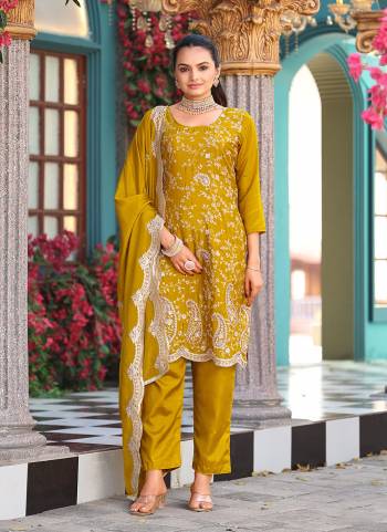 Attrective Looking These Party Wear Suit in Fine Colored Pair With Bottom And Dupatta.These Top Are Silk And Dupatta Are Fabricated On Silk Pair With Santoon Bottom.Its Beautified With Designer Heavy Embroidery Work.