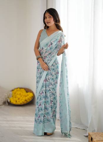 Garb These Party Wear Saree in Fine Colored.These Saree Are Moss Satin Patta And Blouse is Moss Satin Patta Fabricated.Its Beautified With Designer Printed.