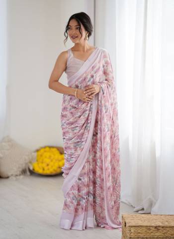 Garb These Party Wear Saree in Fine Colored.These Saree Are Moss Satin Patta And Blouse is Moss Satin Patta Fabricated.Its Beautified With Designer Printed.