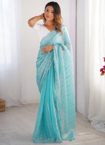 Looking These Party Wear Saree in Fine Colored.These Saree Are Zimmy Choo And Blouse is Fabricated On Mono Banglori.Its Beautified With Fancy Designer Embroidery Work.