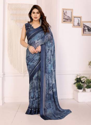 Garb These Party Wear Saree in Fine Colored.These Saree Are Moss Satin Patta And Blouse is Moss Satin Patta Fabricated.Its Beautified With Designer Printed.