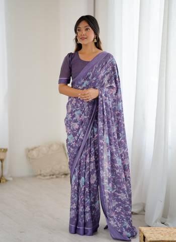 Garb These Party Wear Saree in Fine Colored.These Saree Are Moss Satin Patta And Blouse is Moss Satin Patta Fabricated.Its Beautified With Woven Patta Border Designer Printed.