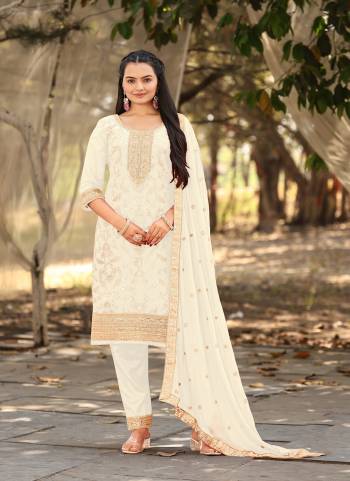 Attrective Looking These Party Wear Suit in Fine Colored Pair With Bottom And Dupatta.These Top Are Viscose Jacquard And Dupatta Are Fabricated On Chinon Pair With Santoon Bottom.Its Beautified With Woven Designer With Embroidery Work.