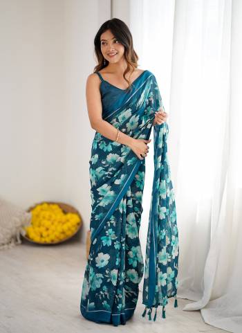 Garb These Party Wear Saree in Fine Colored.These Saree Are Moss Satin Patta And Blouse is Moss Satin Patta Fabricated.Its Beautified With Woven Patta Border Designer Printed.
