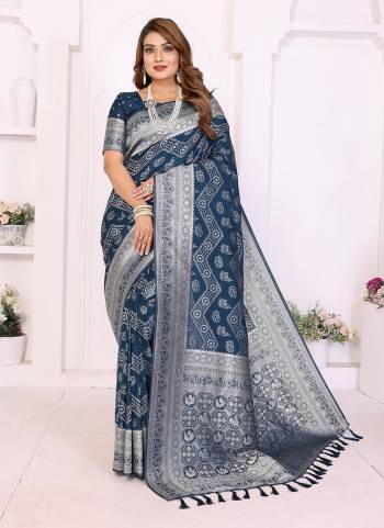 Garb These Festivel,Party Wear Saree in Fine Colored.These Saree And Blouse is Fabricated On Georgette Silk.Its Beautified With Woven Laheriya Jari Designer.