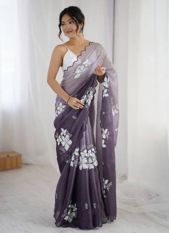 Garb These Party Wear Saree in Fine Dual Shaded Colored.These Saree Are Jimmy Choo And Blouse is Satin Silk Fabricated.Its Beautified With Pedding Color Printed With Designer Sequance Embroidery Work.
