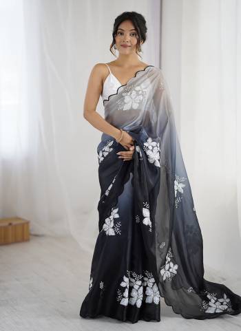 Garb These Party Wear Saree in Fine Dual Shaded Colored.These Saree Are Jimmy Choo And Blouse is Satin Silk Fabricated.Its Beautified With Pedding Color Printed With Designer Sequance Embroidery Work.