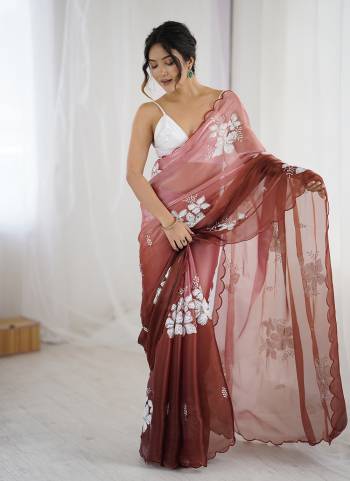 Garb These Party Wear Saree in Fine Dual Shaded Colored.These Saree Are Jimmy Choo And Blouse is Satin Silk Fabricated.Its Beautified With Pedding Color Printed With Designer Sequance Embroidery Work.