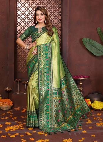 Garb These Festivel,Party Wear Saree in Fine Colored.These Saree And Blouse is Fabricated On Banarasi Tissue Silk.Its Beautified With Woven Paithani Pallu Heavy Designer.