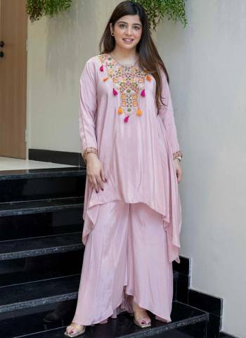 Garb These Suit in Fine Colored Pair With Bottom .These Top Are French Crepe And Bottom Are Fabricated On French Crepe Pair.Its Beautified With Designer Embroidery Work.