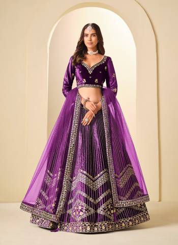 For A Designer Look,Grab These Party Wear Lehenga Choli in Fine Colored.These Lehenga And Blouse Are Fabricated On Ice Velvet Pair With Net Dupatta.Its Beautified With Designer Embroidery Work.
