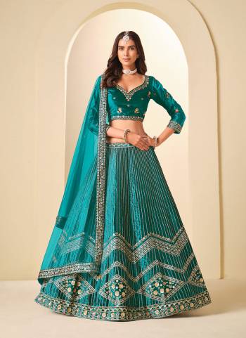 For A Designer Look,Grab These Party Wear Lehenga Choli in Fine Colored.These Lehenga And Blouse Are Fabricated On Ice Velvet Pair With Net Dupatta.Its Beautified With Designer Embroidery Work.