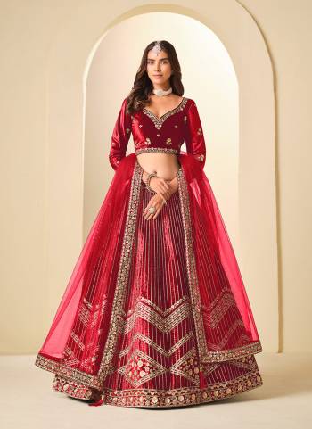 For A Designer Look,Grab These Party Wear Lehenga Choli in Fine Colored.These Lehenga And Blouse Are Fabricated On Ice Velvet Pair With Net Dupatta.Its Beautified With Designer Embroidery Work.