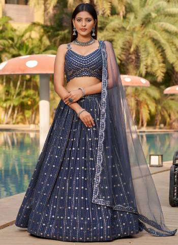 For A Designer Look,Grab These Party Wear Lehenga Choli in Fine Colored.These Lehenga Are Geoegette And Blouse Are Fabricated On Georgette Pair With Dupatta Are Soft Net.Its Beautified With Designer Thread,Sequance Embroidery Work.