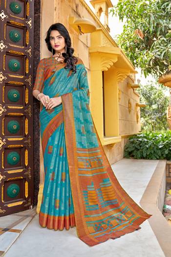 Adorn The Pretty Angelic Look Wearing This Heavy Brasso Designer Saree With Contrasting Blouse. This Saree Is Fabricated On N*P Brasso Paired With Art Silk Fabricated Blouse. Its Pretty Color Pallete Will Give An Attractive Look To Your Personality. 