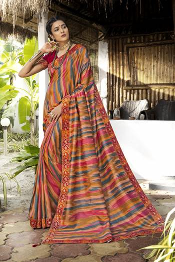 Look Attractive Wearing This Multi Fancy Colored Saree Paired With Family Colored Blouse.  This Heavy Designer Saree Is Fancy Tuli Silk Based And Embroidery Work With Diamond Border Which Gives A Rich Look To Your Personality. Buy This Pretty Saree Now.