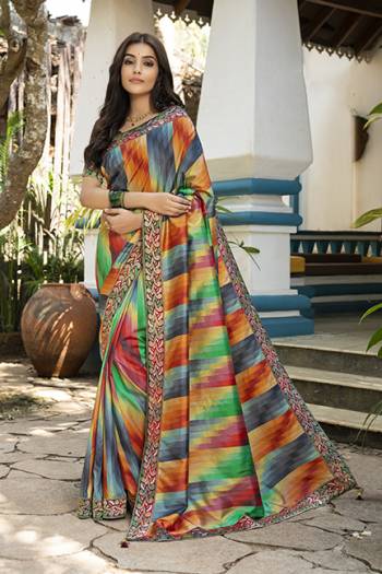 Look Attractive Wearing This Multi Fancy Colored Saree Paired With Family Colored Blouse.  This Heavy Designer Saree Is Fancy Tuli Silk Based And Embroidery Work With Diamond Border Which Gives A Rich Look To Your Personality. Buy This Pretty Saree Now.