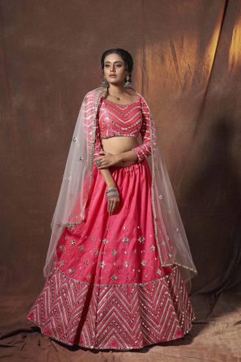 Heavy Designer Lehenga Choli In Light Fancy Color Fabricated On Soft Net Beautified With Heavy Attractive Embroidery. Buye Now.