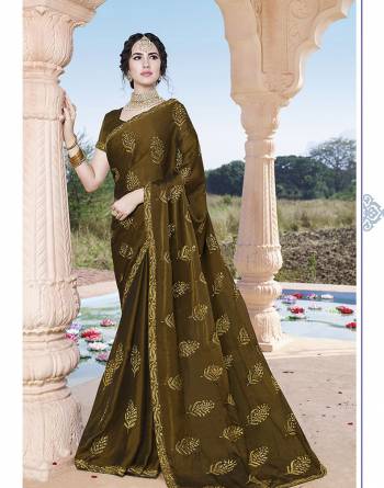 Grab This Pretty Elegant Looking Designer Embroidery Saree In Fancy Color Paired With Contrasting Blouse. This Saree And Blouse Are Silk Based Beautified With Embroidery. Buy Now.