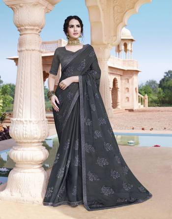 Grab This Pretty Elegant Looking Designer Embroidery Saree In Fancy Color Paired With Contrasting Blouse. This Saree And Blouse Are Silk Based Beautified With Embroidery. Buy Now.