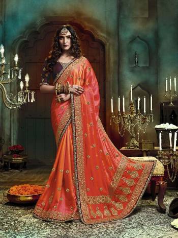 Adorn The Pretty Angelic Look Wearing This Heavy Designer Saree In Heavy Embroidery & Diamond Work In Fancy Color Paired With Contrasting Embroided Blouse. This Saree Is Fabricated On Art Silk Paired With Art Silk Fabricated Blouse. Its Pretty Color Pallete Will Give An Attractive Look To Your Personality. 