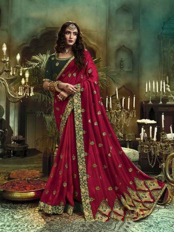 Adorn The Pretty Angelic Look Wearing This Heavy Designer Saree In Heavy Embroidery & Diamond Work In Fancy Color Paired With Contrasting Embroided Blouse. This Saree Is Fabricated On Art Silk Paired With Art Silk Fabricated Blouse. Its Pretty Color Pallete Will Give An Attractive Look To Your Personality. 