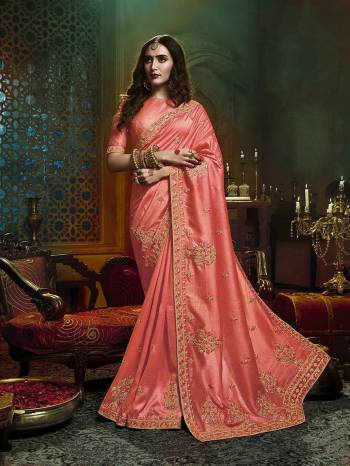 Adorn The Pretty Angelic Look Wearing This Heavy Designer Saree In Heavy Embroidery & Diamond Work In Fancy Color Paired With Contrasting Embroided Blouse. This Saree Is Fabricated On Art Silk Paired With Art Silk Fabricated Blouse. Its Pretty Color Pallete Will Give An Attractive Look To Your Personality. 