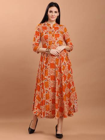 Grab This Readymade Long Kurti In Fine Color Fabricated On Rayon Beautified With Stylist Prints. It Is Light In Weight And Easy To Carry All Day Long. 