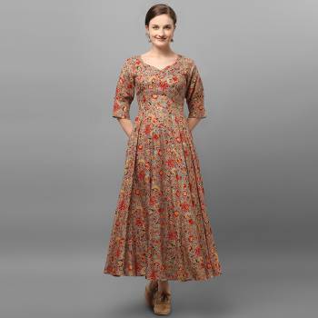 Grab This Readymade Long Kurti In Fine Color Fabricated On Rayon Beautified With Stylist Prints. It Is Light In Weight And Easy To Carry All Day Long. 