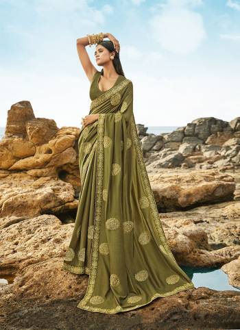 Celebrate This Festive Season In This Very Fancy Fine Colored Saree Paired with Blouse. This Saree and Blouse Are Silk Based Beautified With Detailed Heavy Embroidery Saree With Border Work.Hurry Up.. 