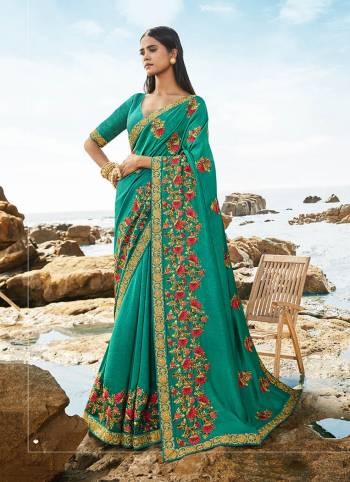 Celebrate This Festive Season In This Very Fancy Fine Colored Saree Paired with Blouse. This Saree and Blouse Are Silk Based Beautified With Detailed Heavy Embroidery Saree With Border Work.Hurry Up.. 