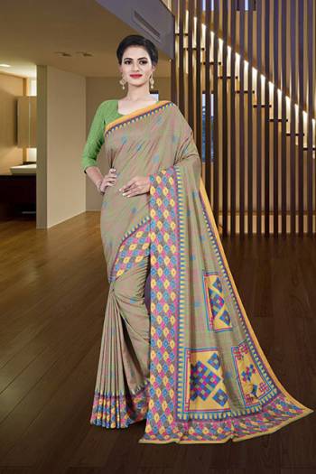 Look Attractive Wearing This English Colored Saree Paired With Matching Colored Blouse.  This Heavy Designer Printed Saree Is Synthetic Cotton Based Which Gives A Rich Look To Your Personality. Buy This Pretty Saree Now.