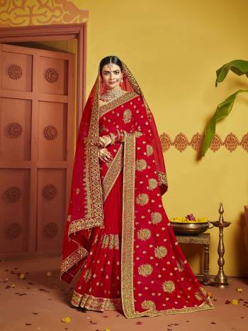 Grab This Pretty Elegant Looking Designer Saree In Red Color Paired With Contrasting Red Colored Blouse. This Saree And Blouse Are Silk Based Beautified With Heavy Jari Embroidery & Embroidery Border. Buy Now.