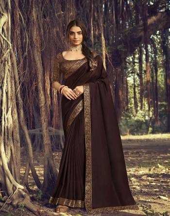 Adorn The Pretty Angelic Look Wearing This Heavy Look Saree In Color Paired With Contrasting Matching Broket Colored Blouse. This Saree Is Fabricated On Vichitra Silk Paired With Jacquard Broket Fabricated Blouse. Its Pretty Color Pallete Will Give An Attractive Look To Your Personality. 